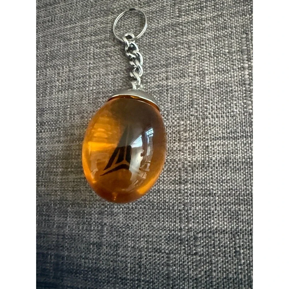 Jurassic park JA 3 Nike Keychain Amber Keychain Pendant
